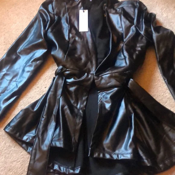 Faux leather peplum style with belt top or jacket - Picture 1 of 7